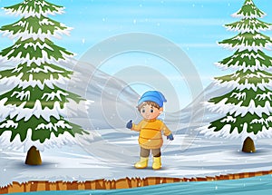 Boy wearing warm jacket and hat in wintertime