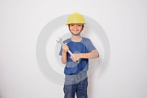 Boy wearing yellow hat engineer idea
