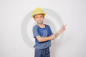 Boy wearing yellow hat engineer idea