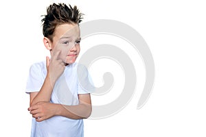 A boy in a white T-shirt and with spiky hair shows a mixed emotion. The child was conceived. Space for your text