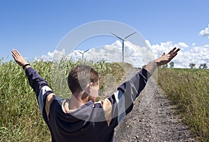 Boy and wind turbine