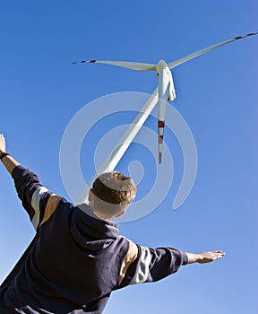 Boy and wind turbine