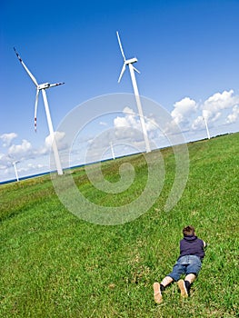 Boy and wind turbines photo