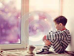 Boy in winter window