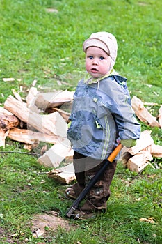 Boy with wood chopper