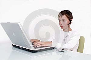 Boy working on computer