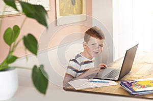 Boy working on the computer during homeschooling