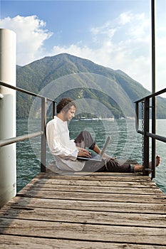 Boy working on a gangway photo