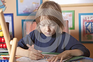 Boy Working on his Homework