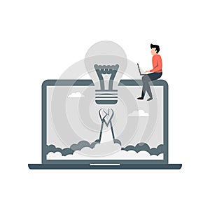 The boy is working on laptop