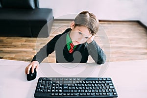 Boy working on a PC