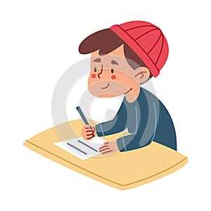 Boy Writing with Red Cap