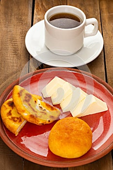 Boyacense arepa for breakfast, accompanied with cheese, almojabana and aguapanela