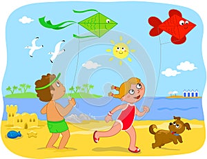 BoyBoy and girl playing with kites at the beach