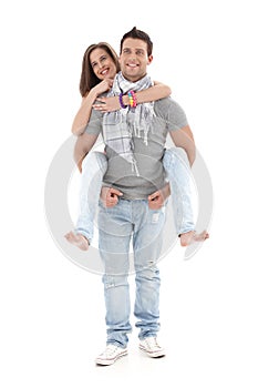 Boyfriend carrying girl on back, laughing