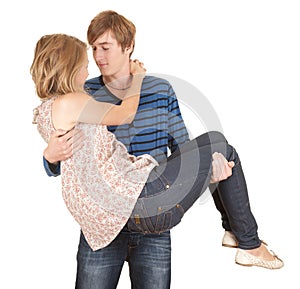 Boyfriend carrying girl in his arms