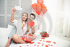 Boyfriend and girlfriend taking selfie