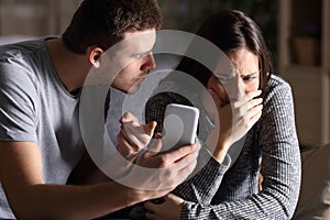 Boyfriend show phone to his cheater girlfriend photo