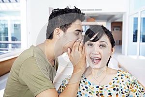 Boyfriend tell secret to girlfriend at home