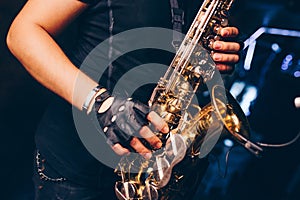 Boys Band saxophone section at event , jazz player male playing on Saxophone, music instrument played by man saxophonist