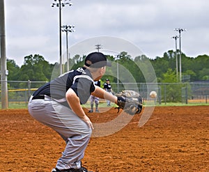 Boys Baseball Catching a Throw