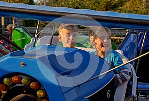 Boys on Carnival Plane Ride