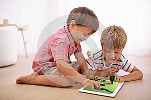 Boys, children and tablet with 3d games, virtual experience and bonding together in home or house. Brothers, family or