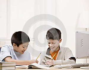 Boys doing homework together