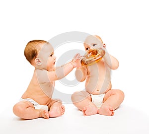 Boys eating bread roll