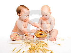 Boys eating bread roll