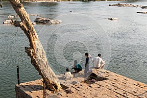 Boys fishing in a river