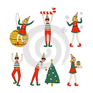 Boys and girls Christmas elf characters Set. Cute Santa Claus helpers decorated fir tree, holding gift boxes cartoon