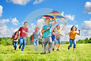 Boys and girls with kite