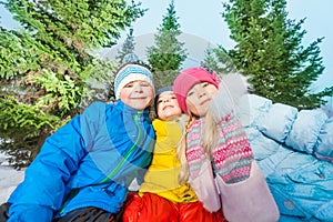 Boys and girls together close portrait in winter