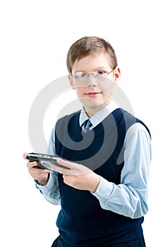 Boys hand playing portable video game