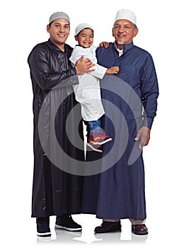 The boys always have smiles. Studio portrait of the male members of a muslim family isolated on white.