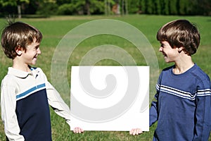 Boys Holding A Message