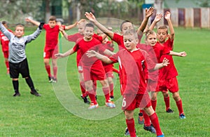 Boys kicking ball