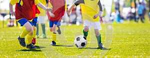 Boys kicking football soccer match.Youth football league
