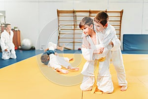 Boys in kimono fights, kid judo training