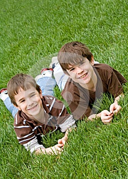 Boys Laying in Grass