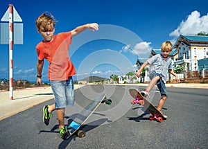 Boys on longboard skate