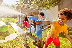 Boys in the middle of water gun fight action game