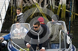 Boys off fishing in motorboat