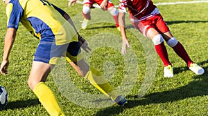 Boys play soccer sports field