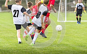 Boys play soccer sports field