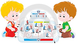 Boys play table hockey