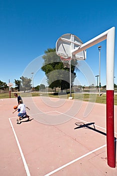 Boys Playing Basketball