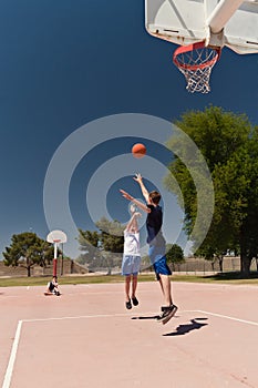 Boys Playing Basketball