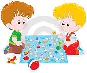 Boys playing with a boardgame